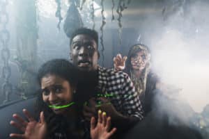 A young couple being followed by a zombie at a haunted house in Myrtle beach. 