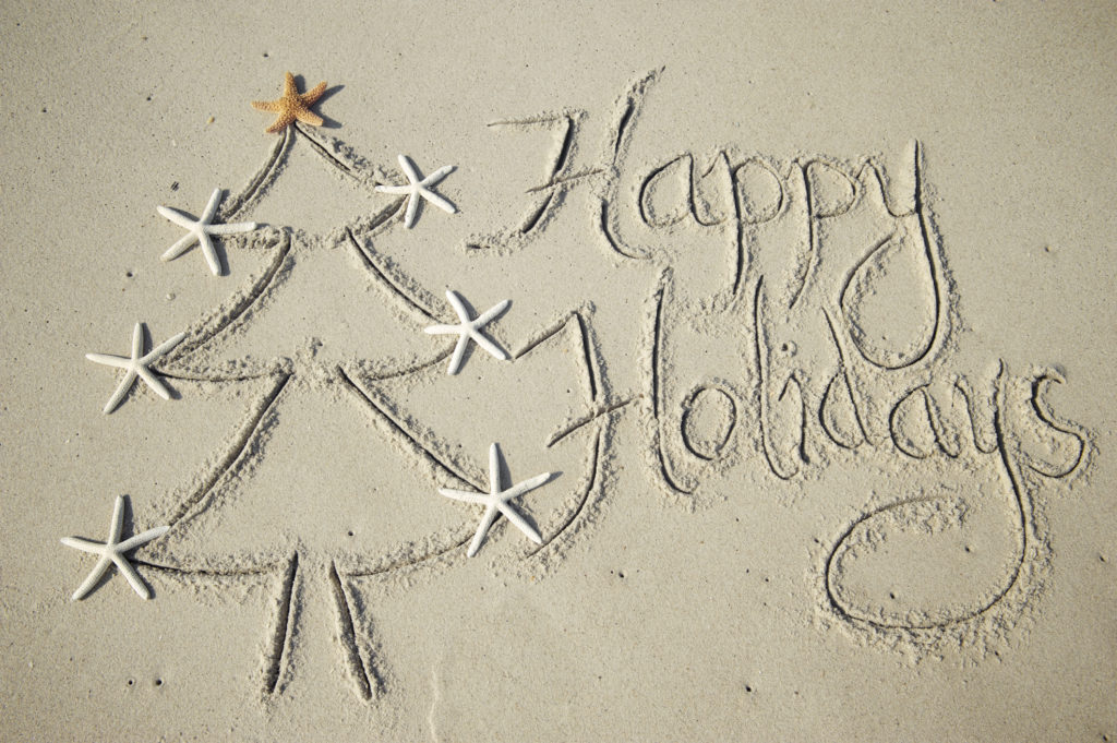 Happy Holidays Message Handwritten with Tree in Smooth Sand