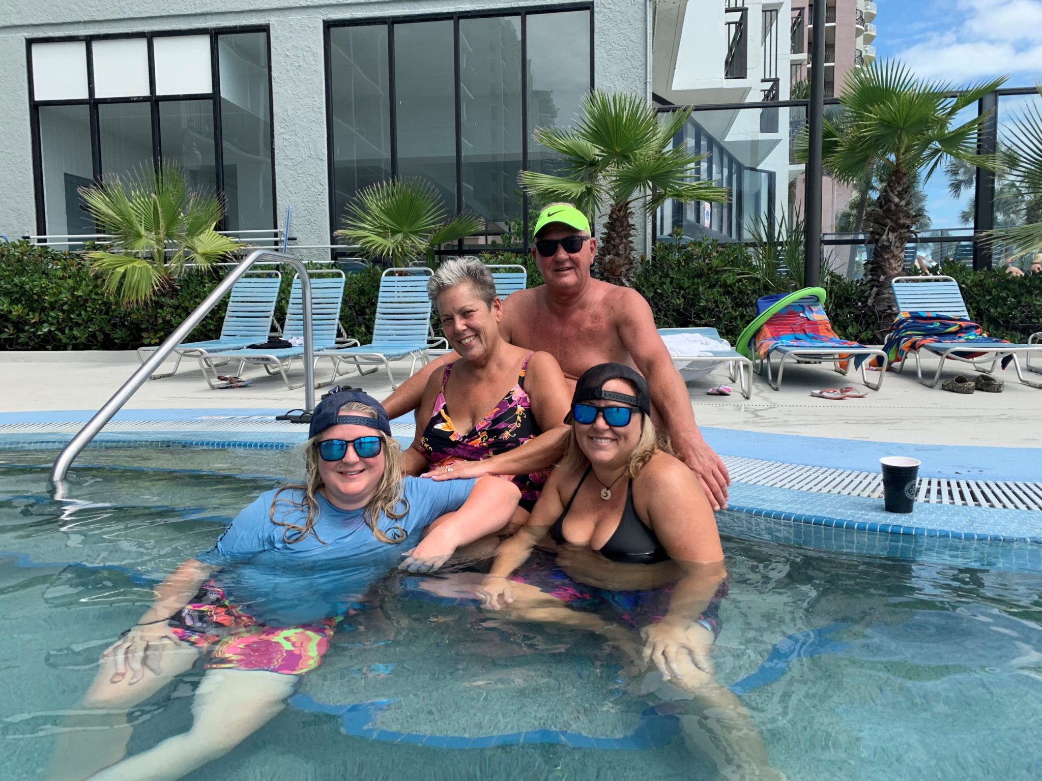 family in pool