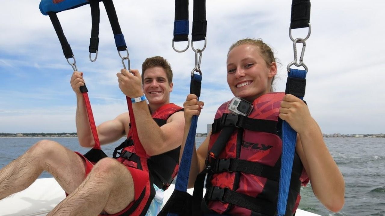 Couple parasailing on the ocean